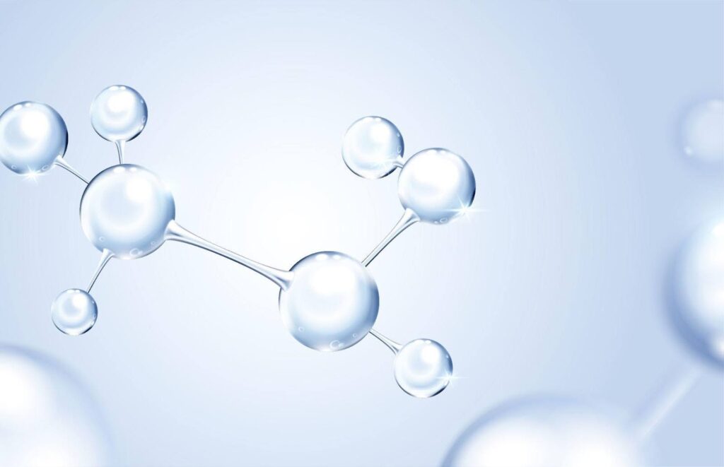 A molecule and bubbles in the background represent a vibrant scientific theme