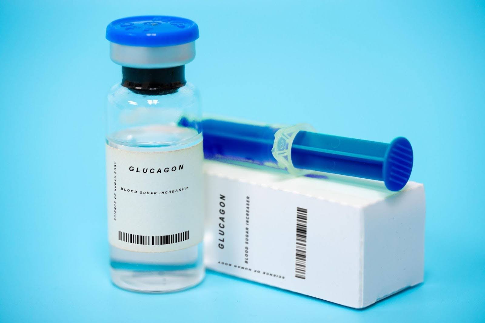 A vial of blood placed beside a closed box indicating a medical or laboratory context